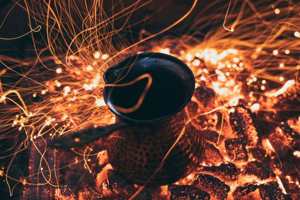 Traditional Turkish coffee prepared slowly in a copper cezve