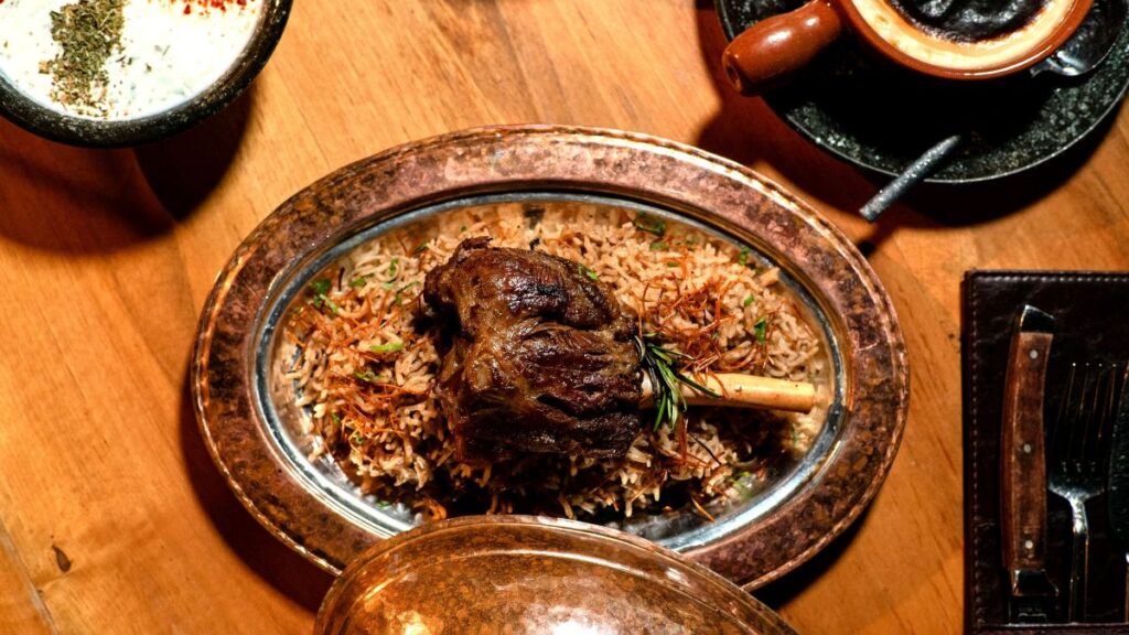 Traditional Ottoman cuisine with lamb rice and dried fruits