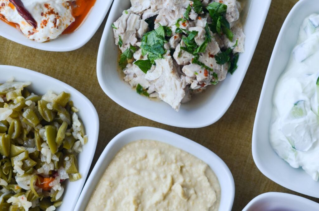 Aegean style Turkish meze table with olive oil dishes and seafood