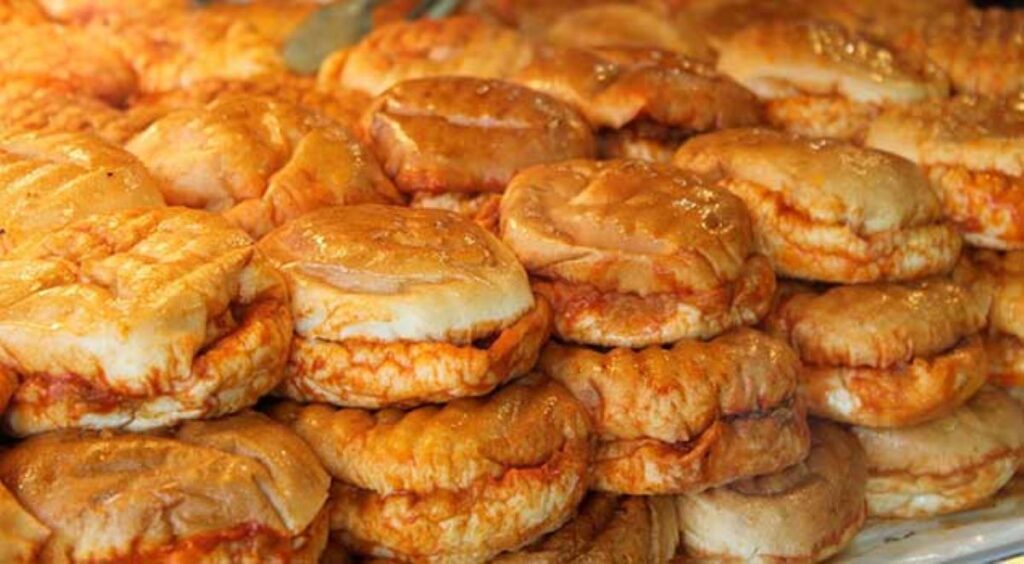Wet burgers displayed in a street food shop near Taksim Square