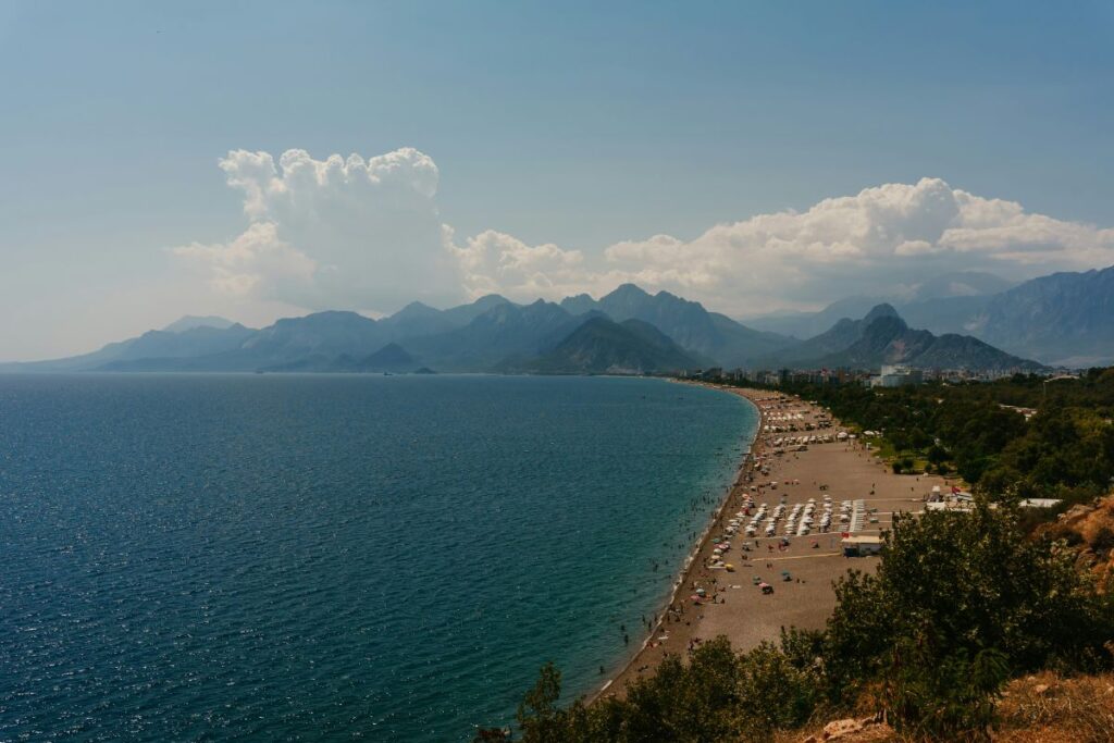Konyaalti Beach with the Taurus Mountains in Antalya Turkey