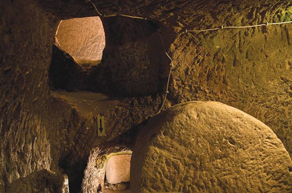 Massive circular stone door used to protect Cappadocia's underground cities